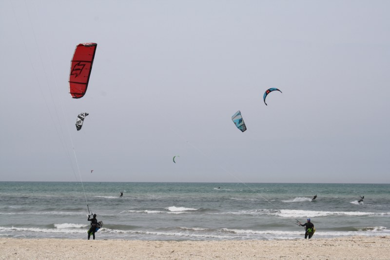 Surfers in Senigallia in April 2015